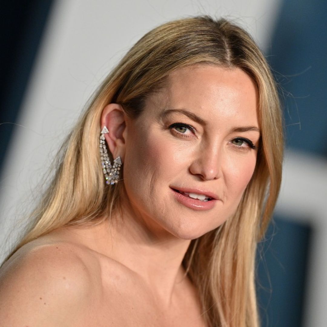 Kate Hudson shows off goddess-like hair clad in strappy silk gown for special night out