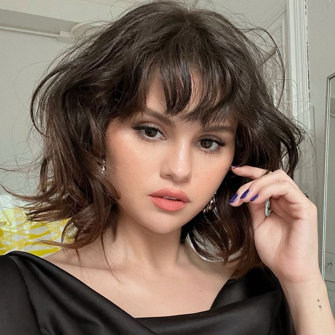 Selena Gomez jumps on the yellow swimsuit trend in romantic snap with Benny Blanco