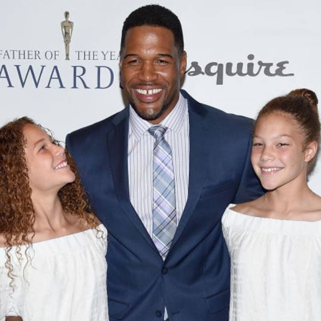 Michael Strahan shares vacation photos alongside twin daughters