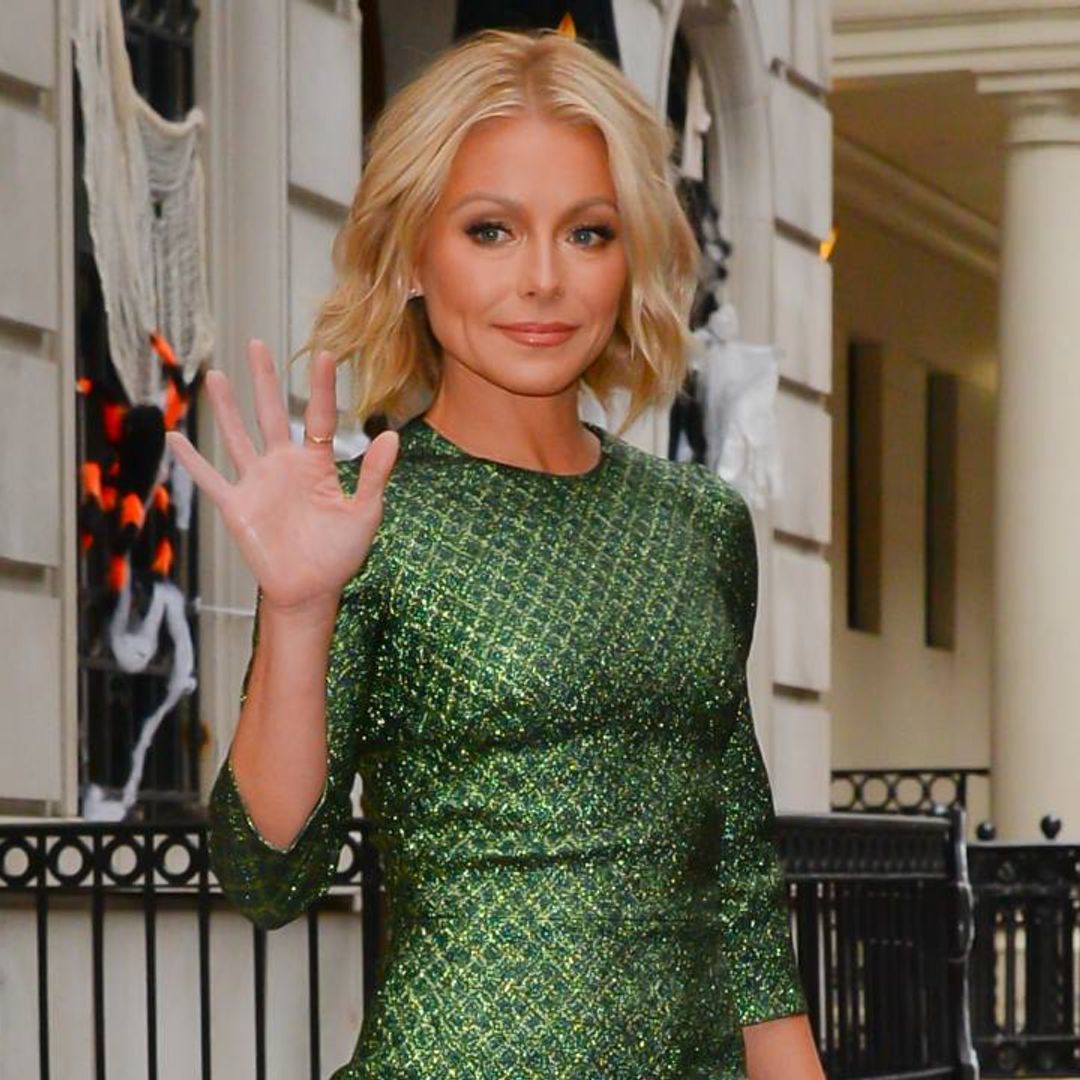 Kelly Ripa sparkles in a shimmery studded top - and her red pants are 50% off