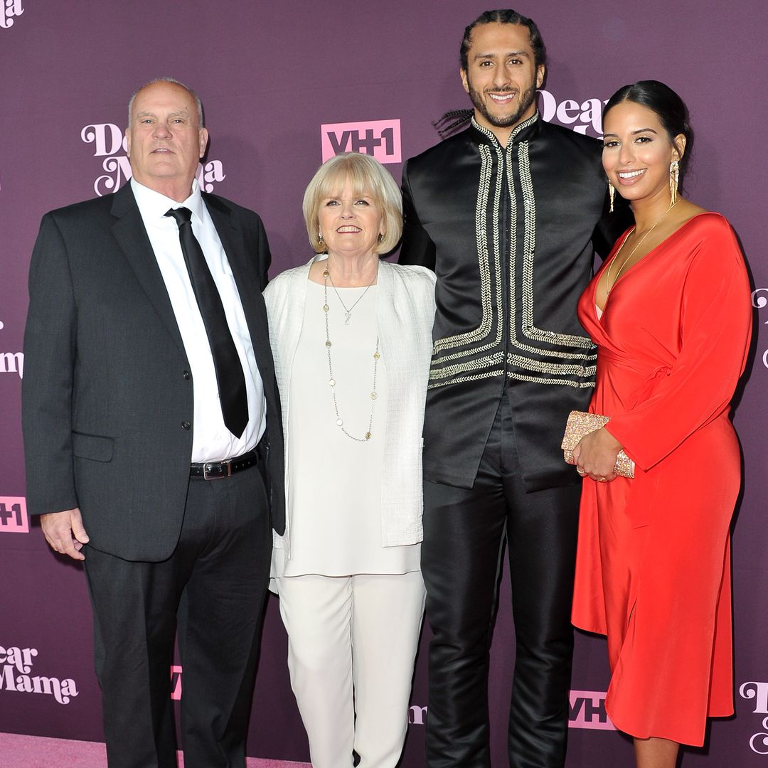 Colin Kaepernick smiling with his parents, Teresa Kaepernick and Rick Kaepernick, and his girlfriends Nessa Diab