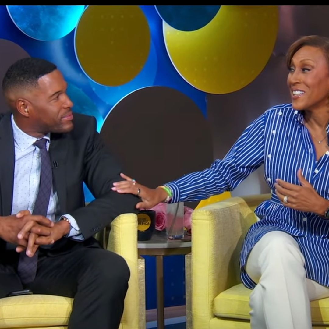 Michael Strahan makes emotional return to GMA as co-anchors show support