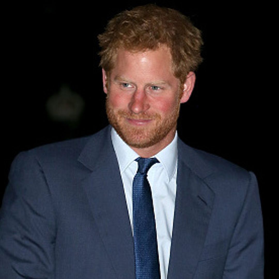 Prince Harry wears a suit – and that beard! - for Rugby World Cup party