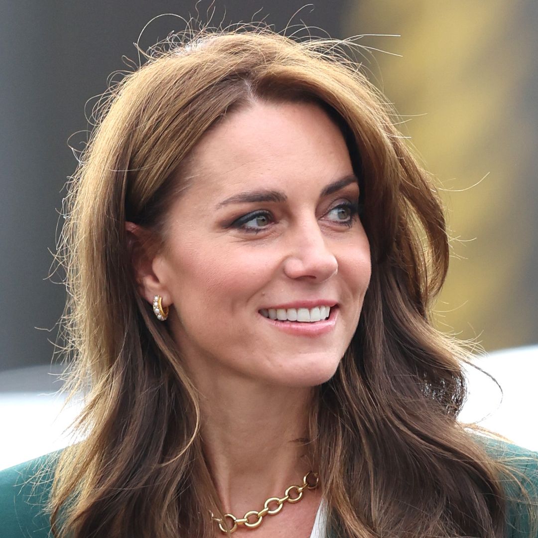 Princess Kate is a total boss in pinstripes for surprise appearance