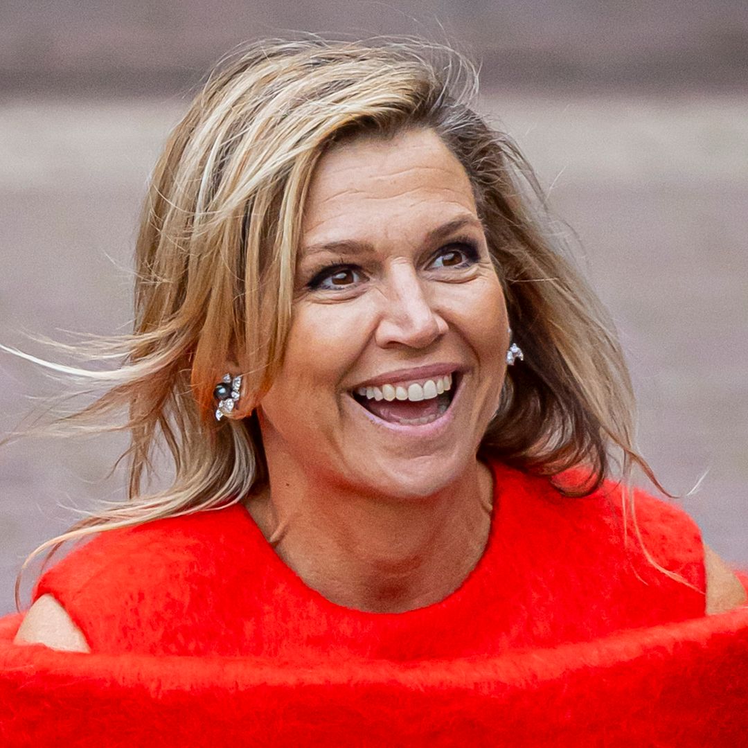 Queen Maxima surprises in shoulder-baring fuzzy top