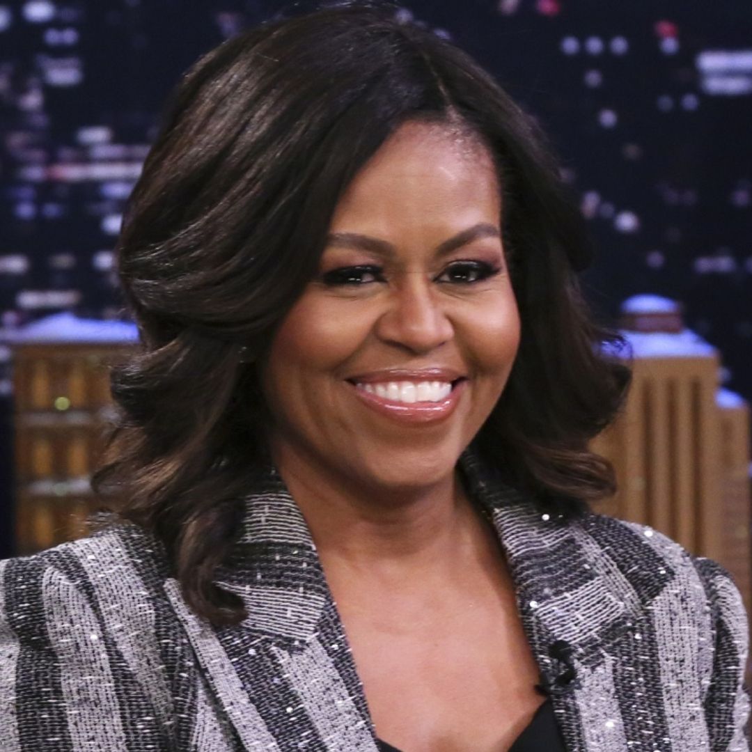 Michelle Obama's latest satin and denim book tour look is truly one for the ages