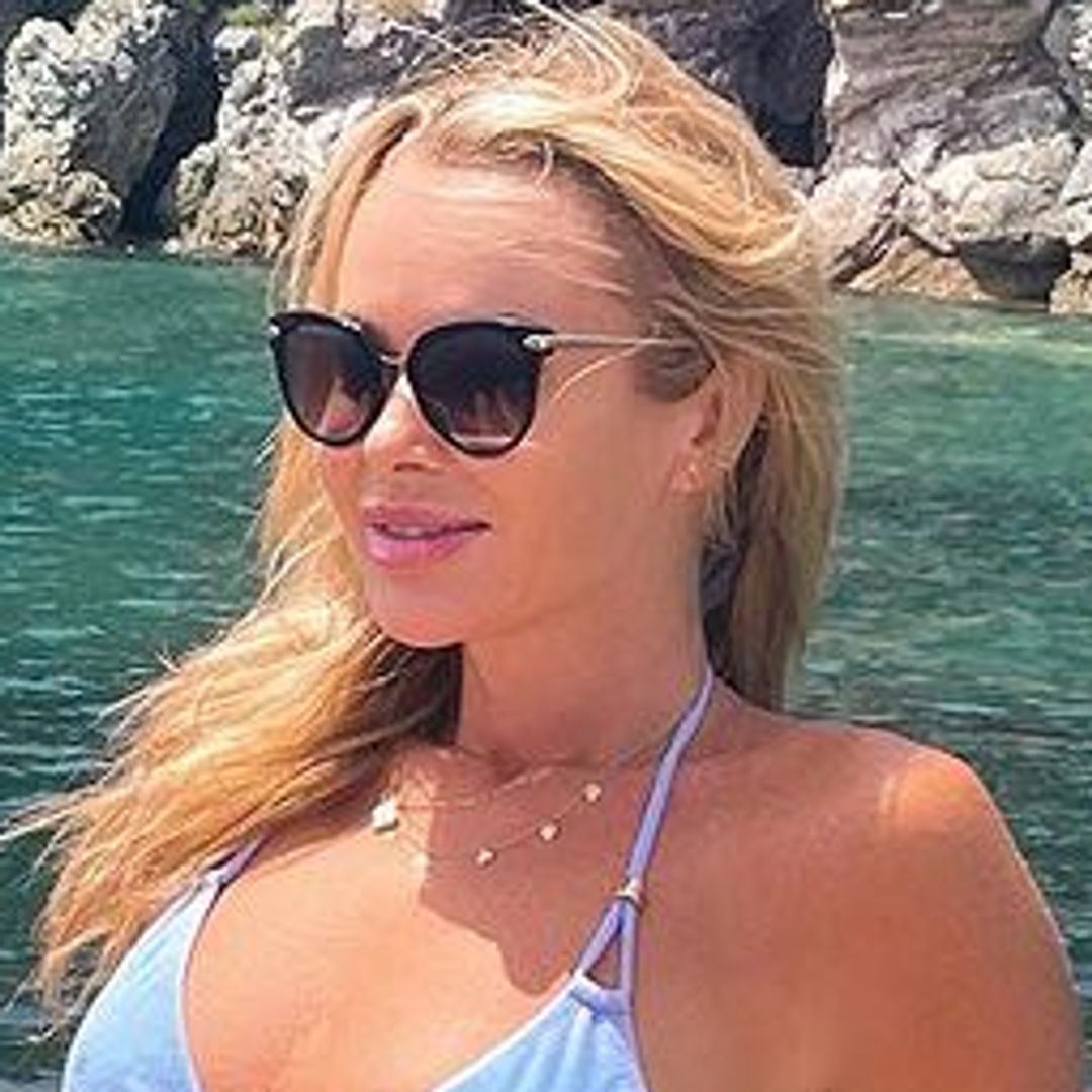 Amanda Holden shows off impeccable physique in tiny triangle bikini during lavish family holiday