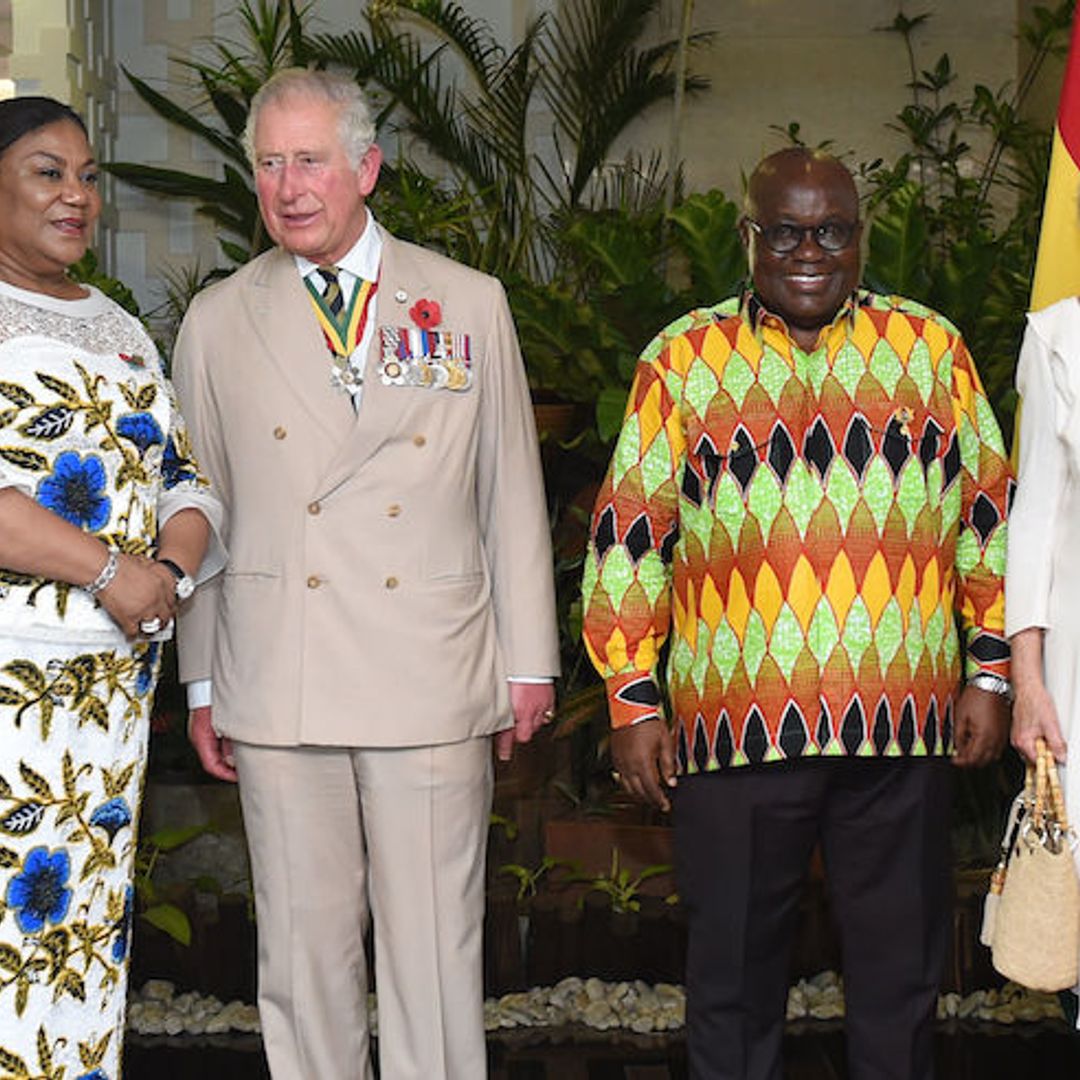 The Duchess of Cornwall is chic in white midi dress as she arrives in Ghana with Prince Charles