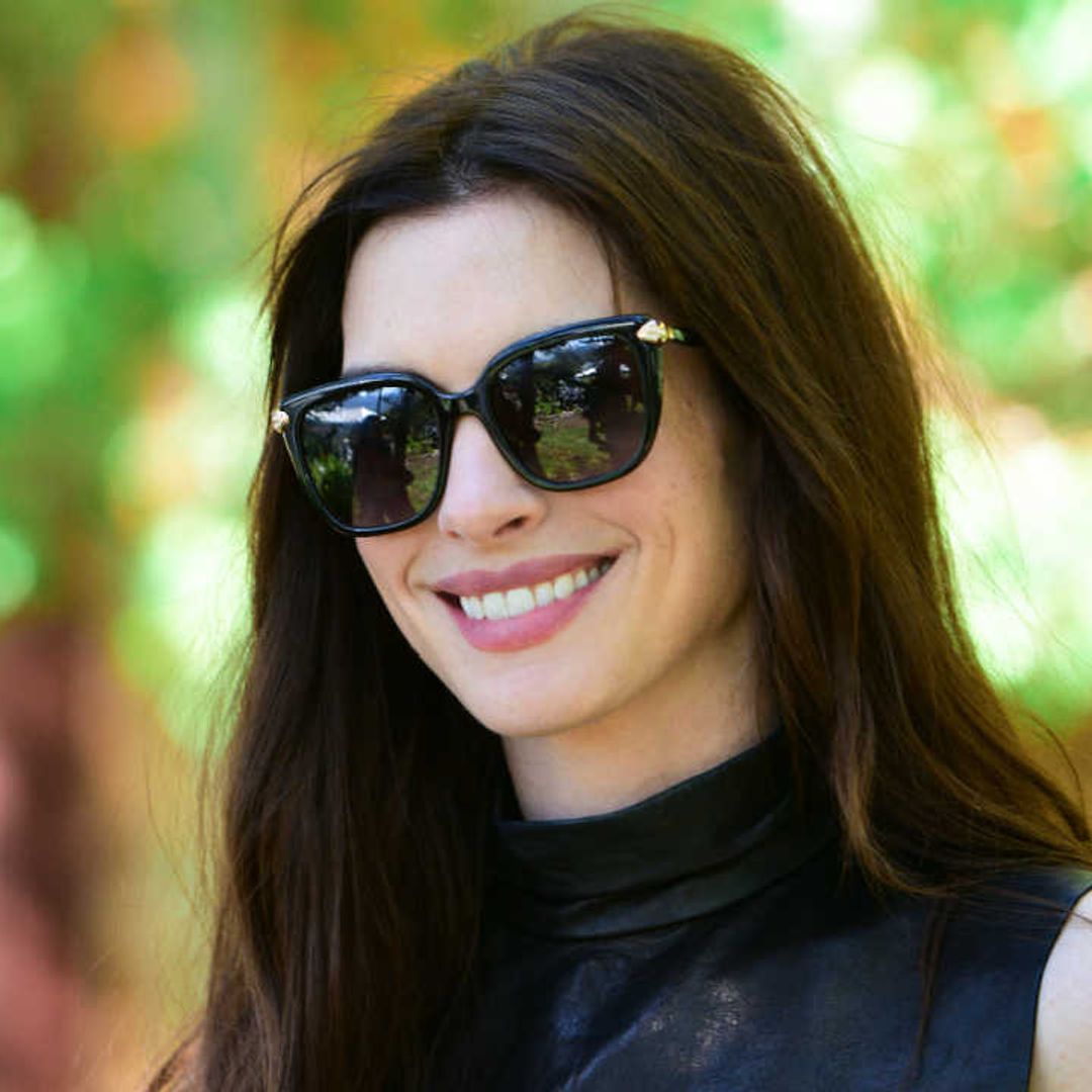 Anne Hathaway's white puff-sleeved dress is the coolest end-of-summer look