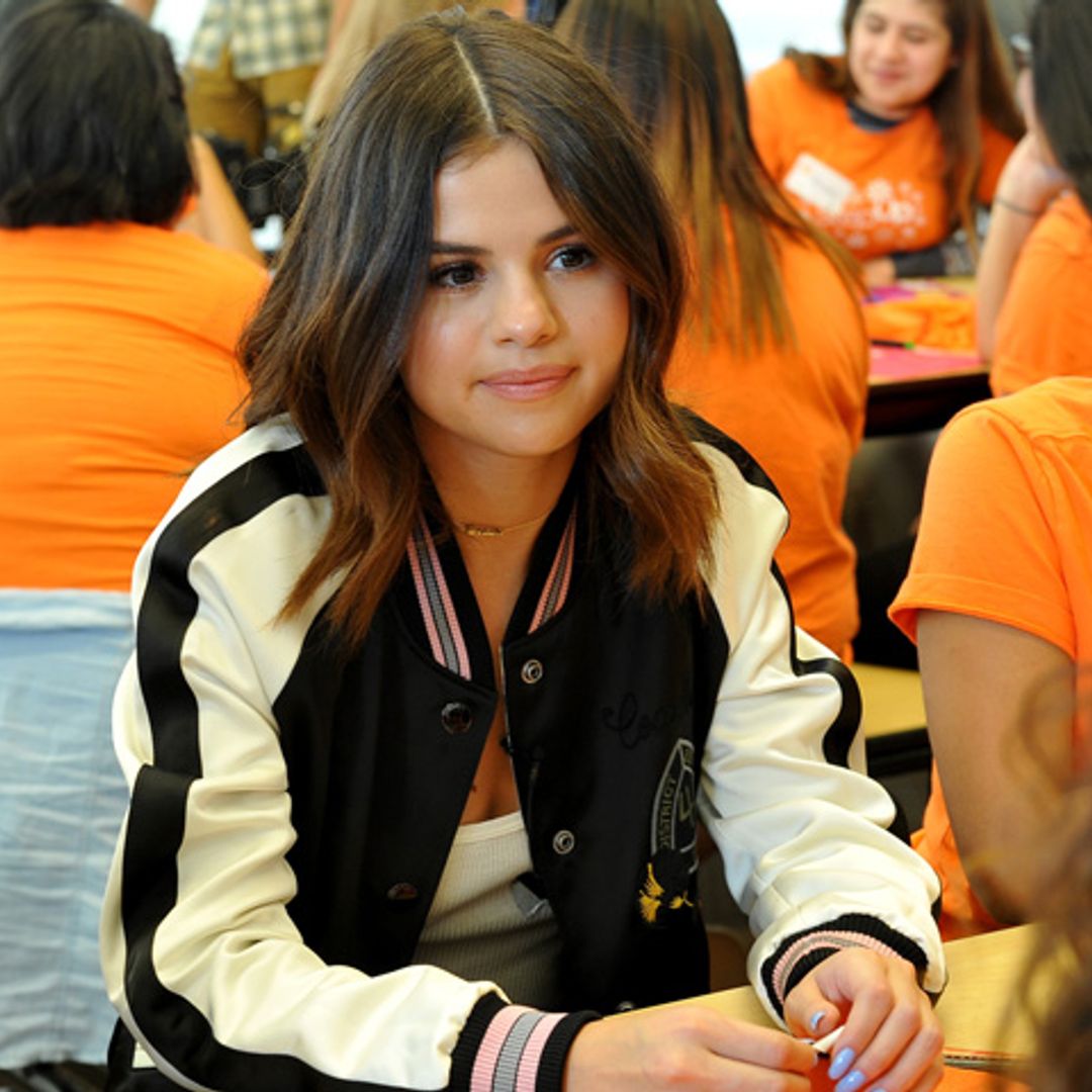 Selena Gomez encourages teens to love themselves first during a surprise high school visit