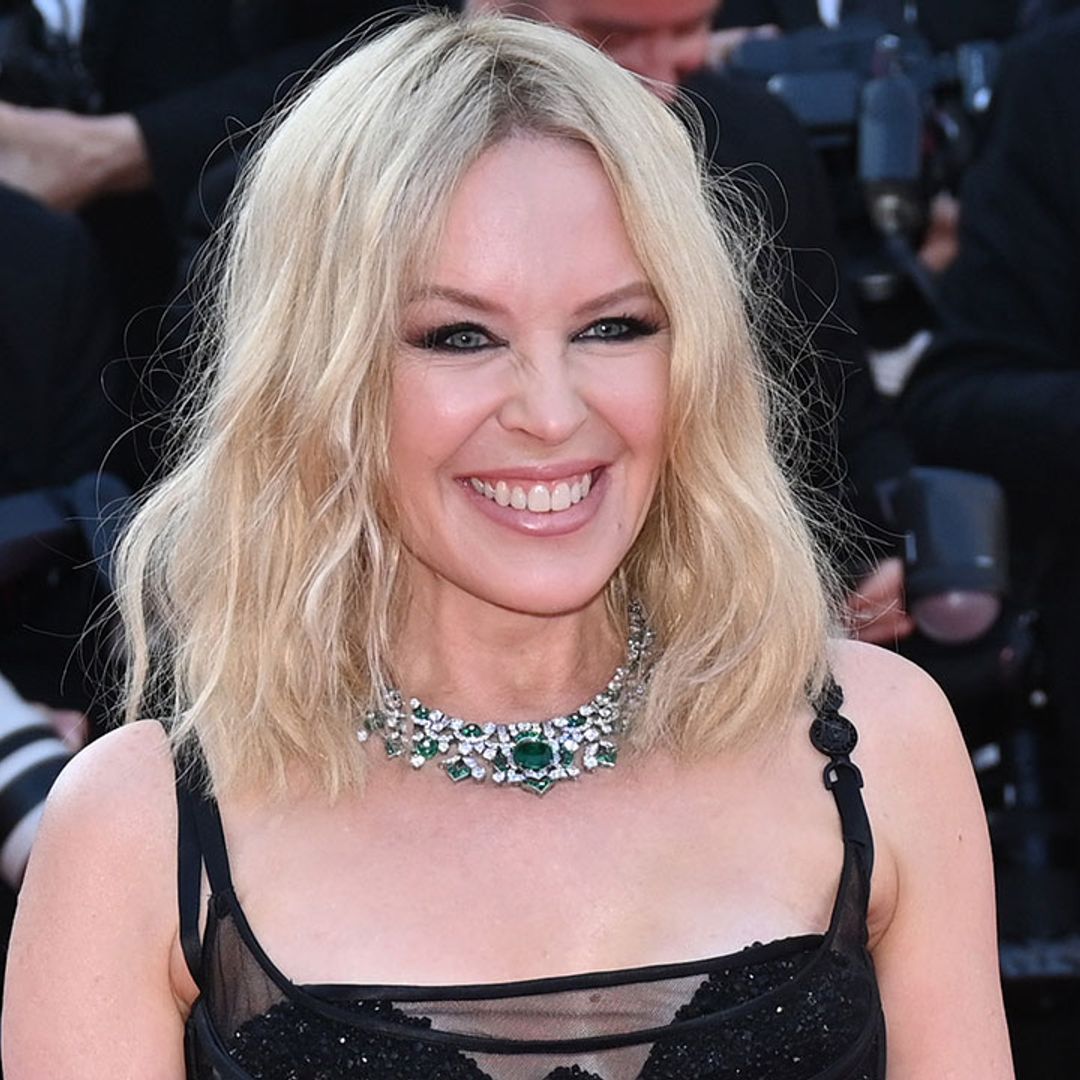 Kylie Minogue sizzles in striking silver dress to announce exciting news