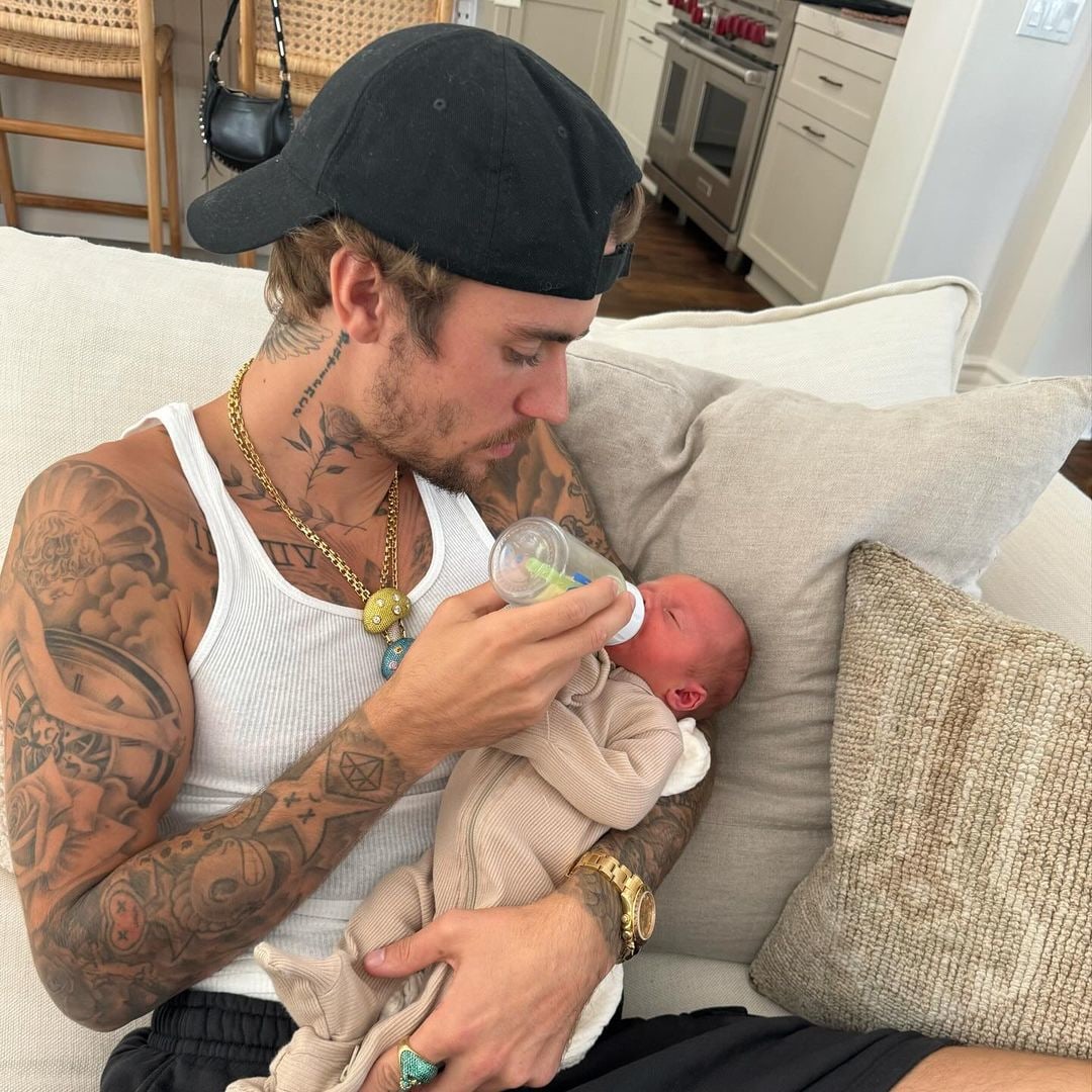 Justin and Hailey Bieber look ultra-broody as Justin kisses tiny baby