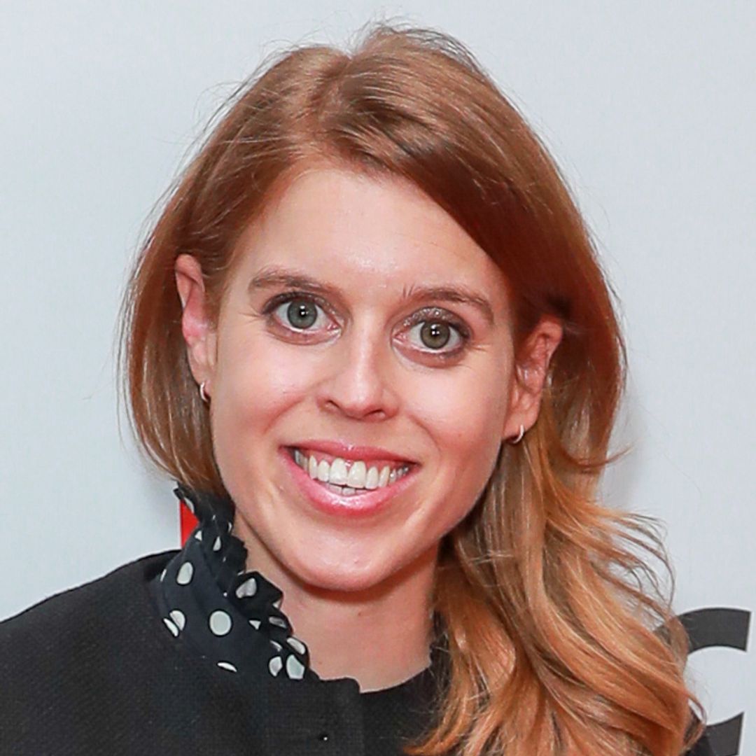 Princess Beatrice's tumbling red hair is amazing with this high-fashion jacket