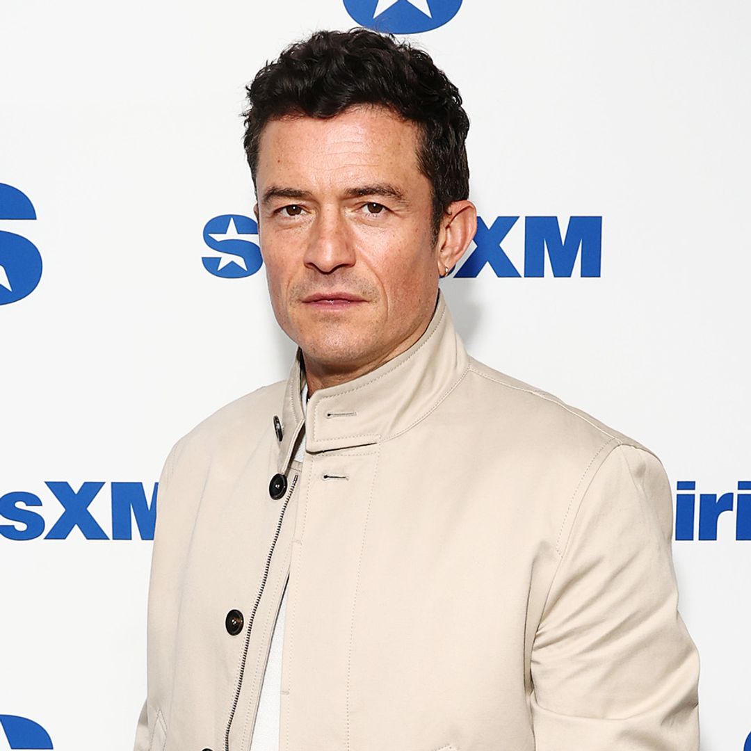 Orlando Bloom admits he's 'very emotional' as he leans on surprising companion for support