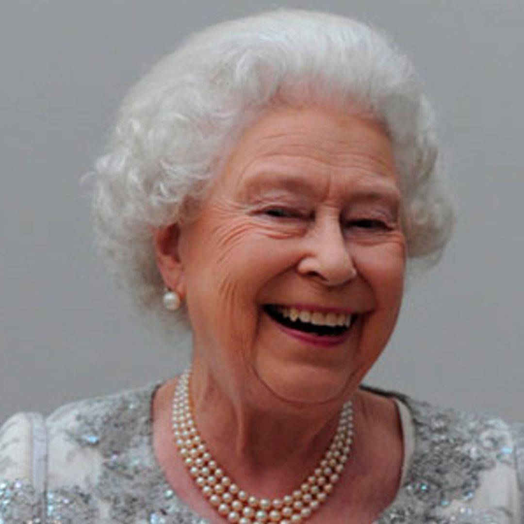 What did Bono say to make the Queen giggle?