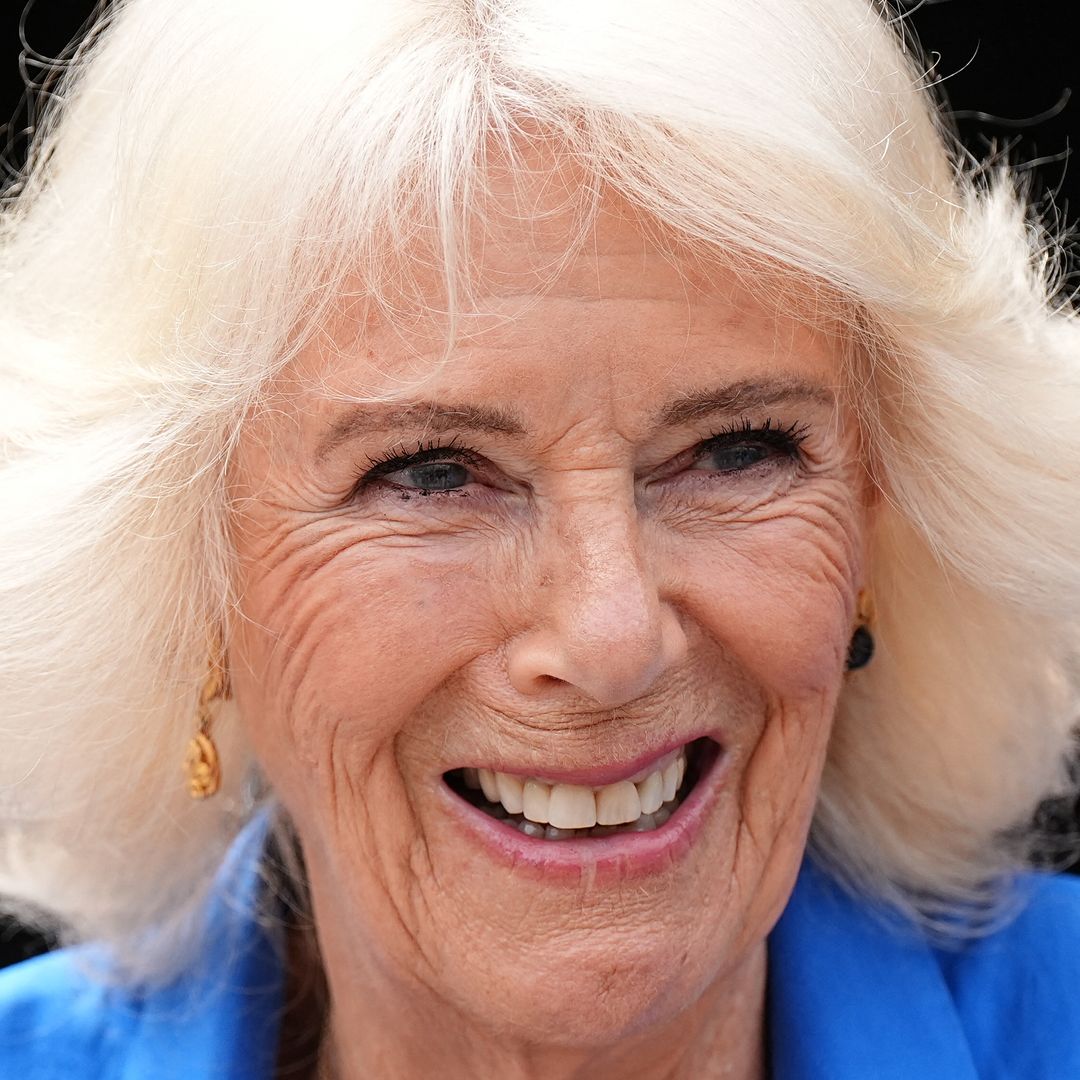 Queen Camilla cuddles adorable rescue dog Moley at ultra-private home