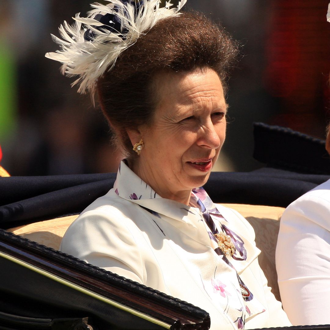 Princess Anne goes bold in white waist-defining mother-of-the-groom dress