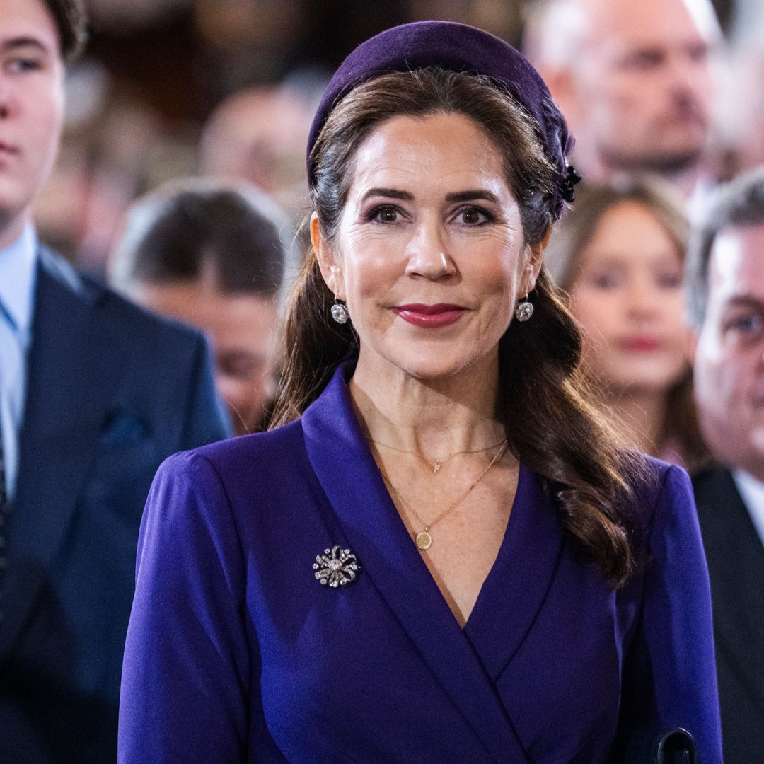 Queen Mary of Denmark is a vision in purple for church service with King Frederik X and children following accession