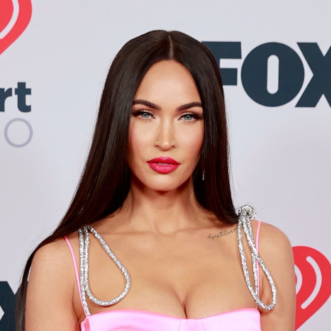 Megan Fox opts for red carpet glamor in red corset gown for pre-Grammys party