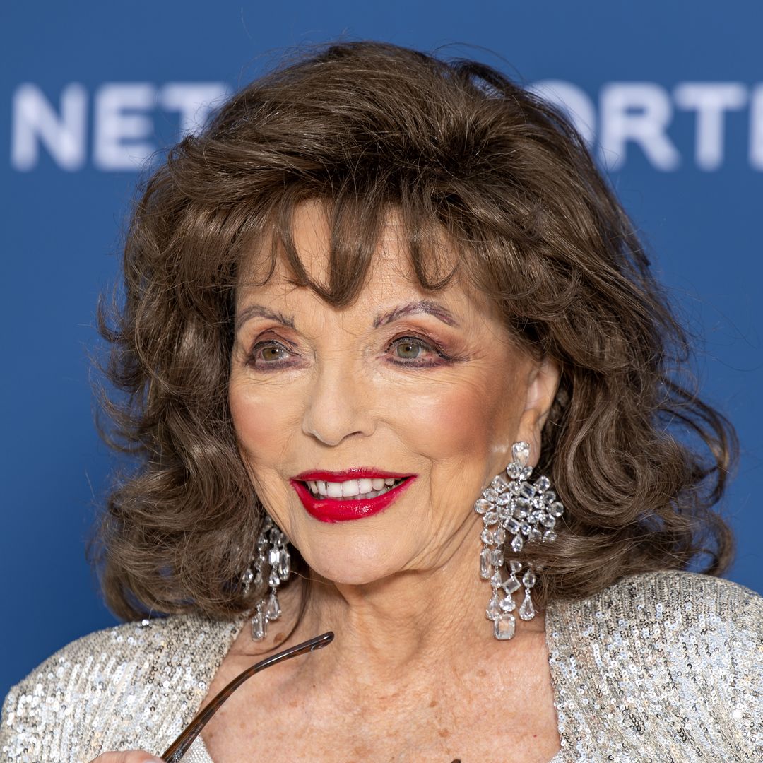 Joan Collins 'exuberates confidence' in mini-shorts at 92