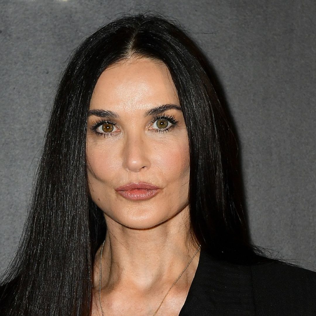 Demi Moore stuns in a revealing power suit with an unexpected touch
