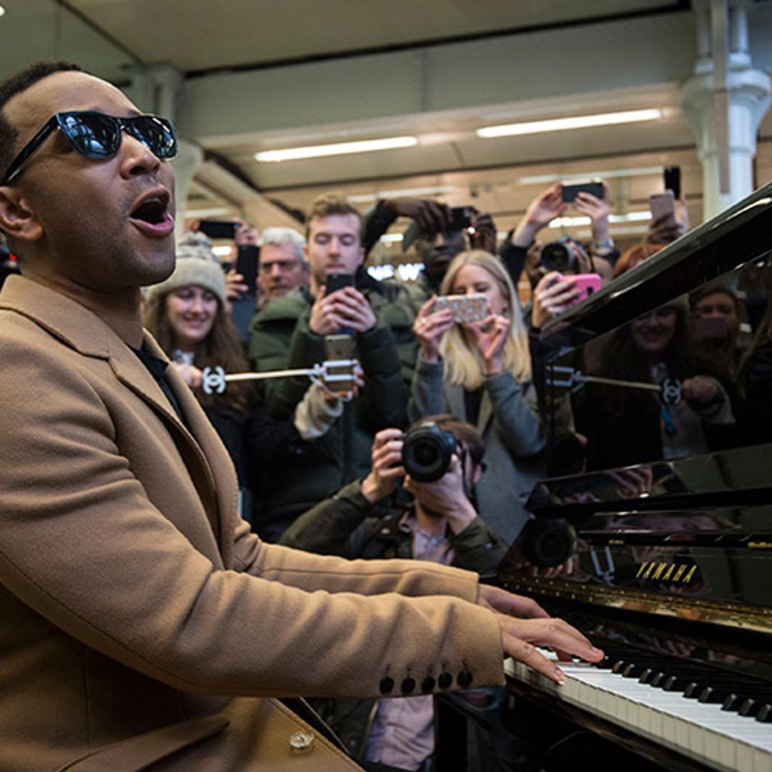 John Legend surprises commuters with impromptu performance at London St Pancras