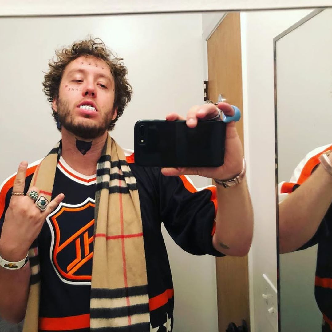 Jack Robbins takes a selfie wearing fake teeth, shared on Instagram