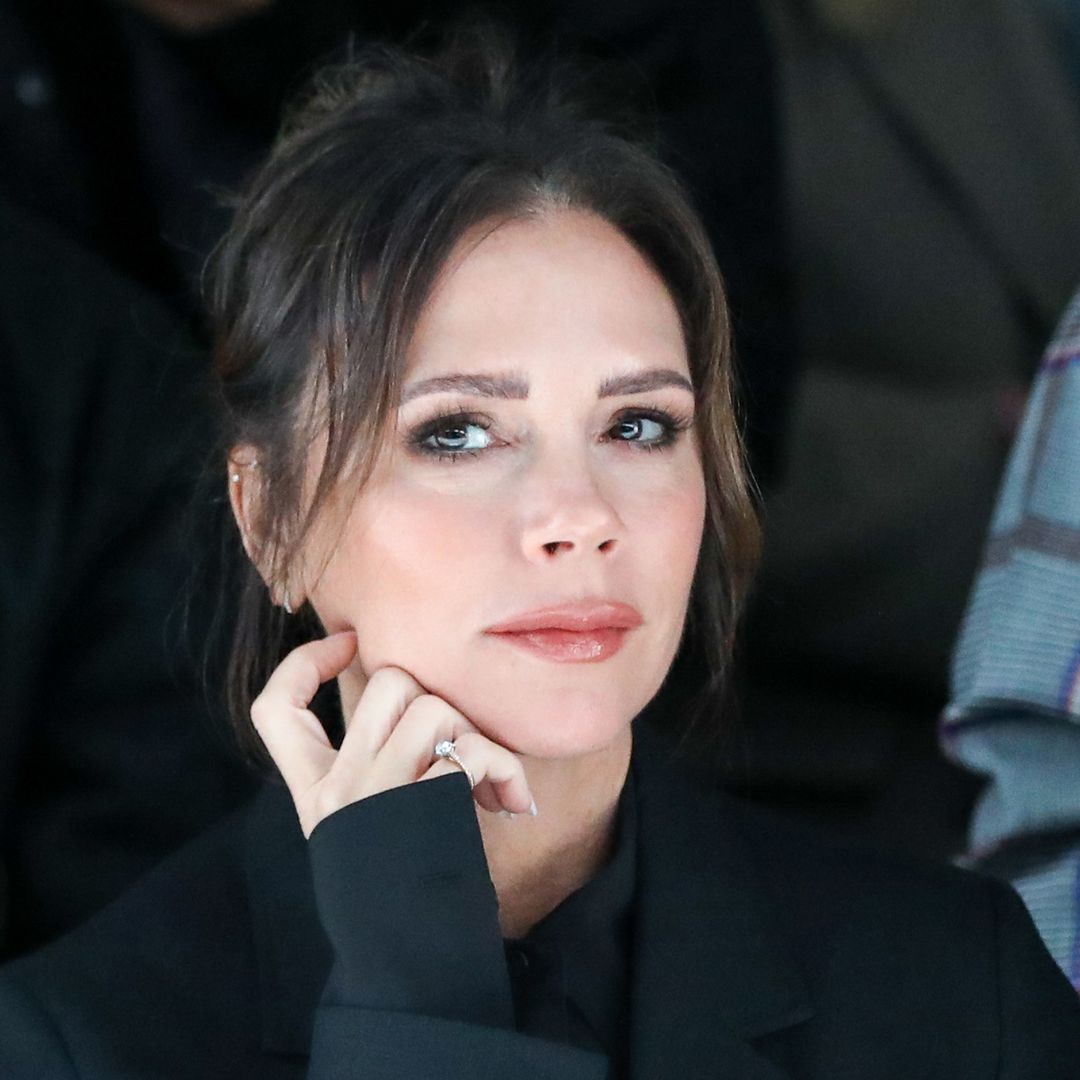 Victoria Beckham looks so tanned in little black dress on family holiday