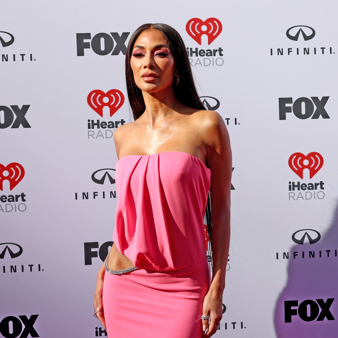 Nicole Scherzinger stuns in strapless cut-out gown in the boldest colour