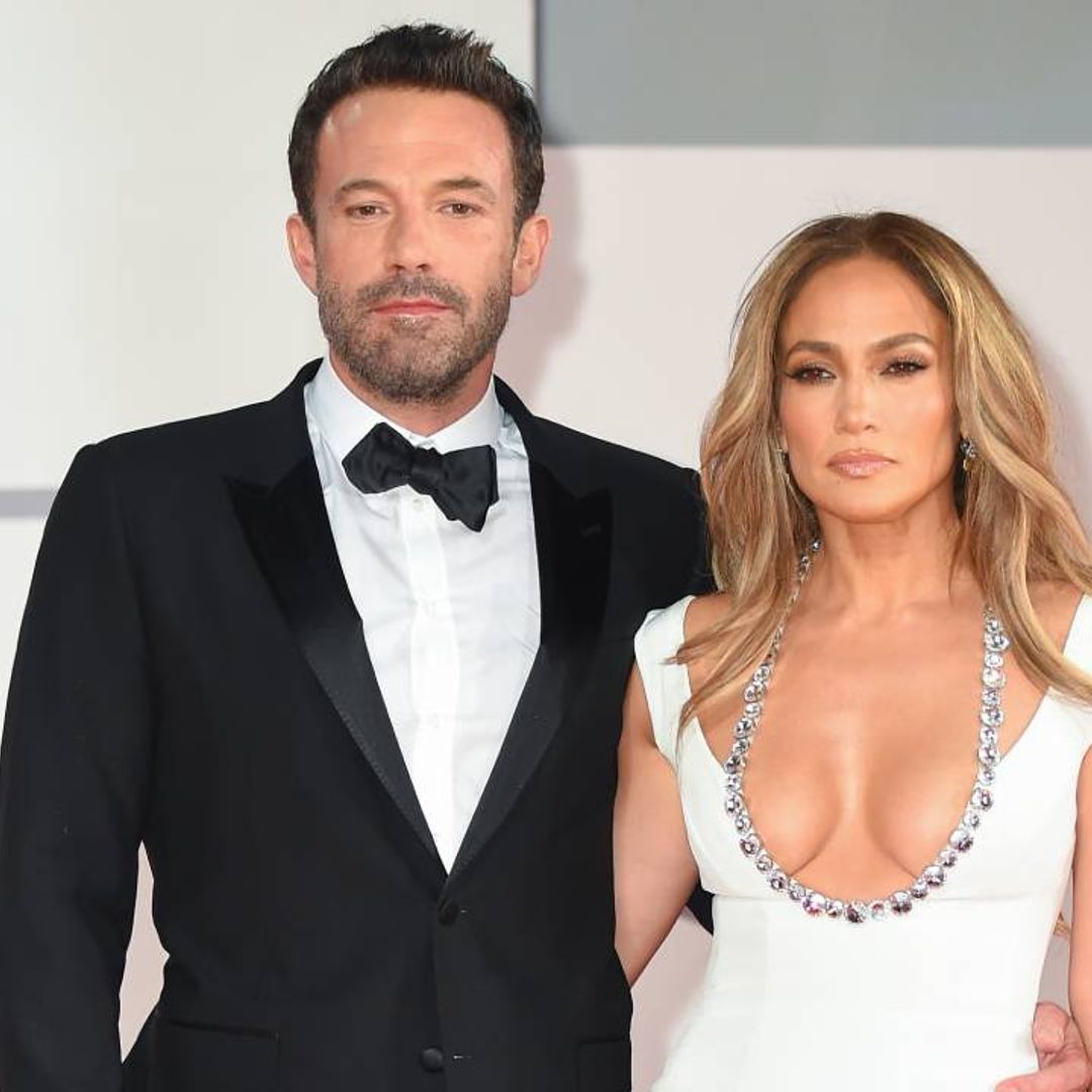 Jennifer Lopez wows in a silk dress as Ben Affleck comes to her rescue
