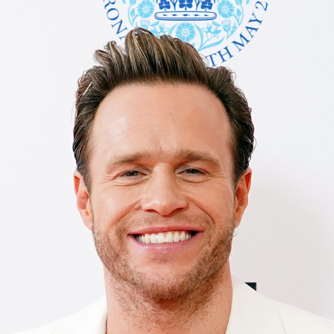 Olly Murs is a doting dad as he cradles baby daughter Madison in new photo