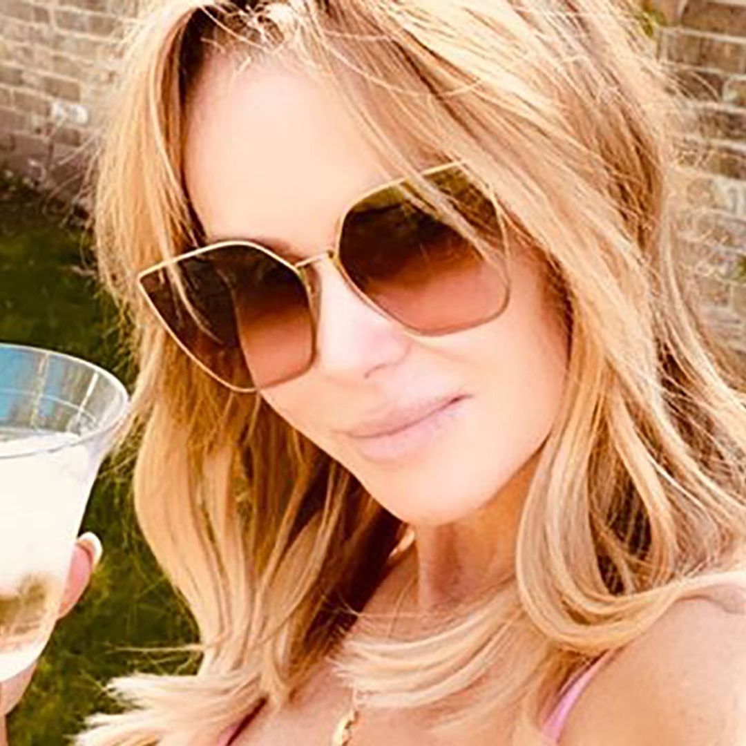 Amanda Holden stuns in gorgeous red bikini during UK beach break – and we've spotted it in the sale
