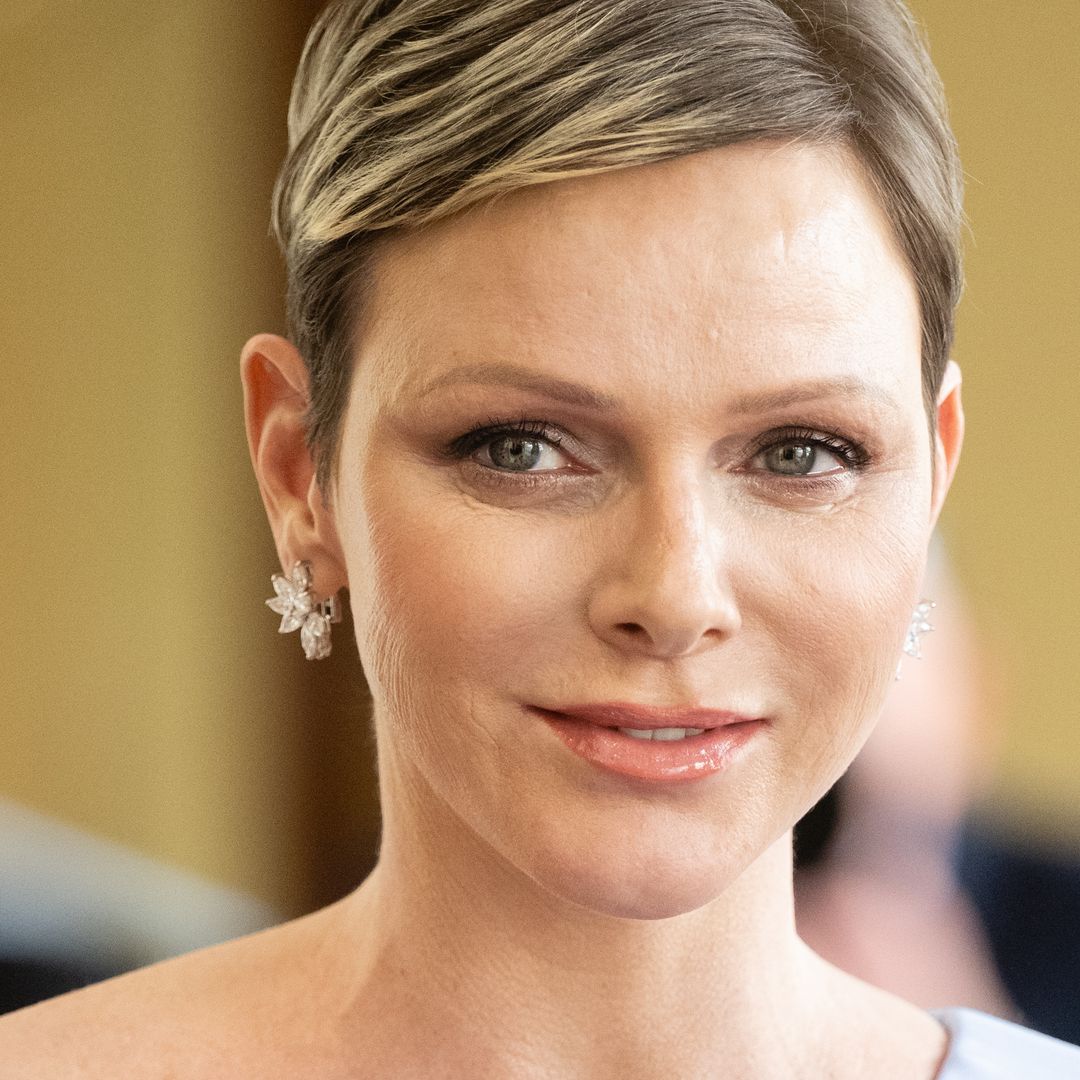 Princess Charlene looks so chic in slim-fit trousers for special appearance with twins