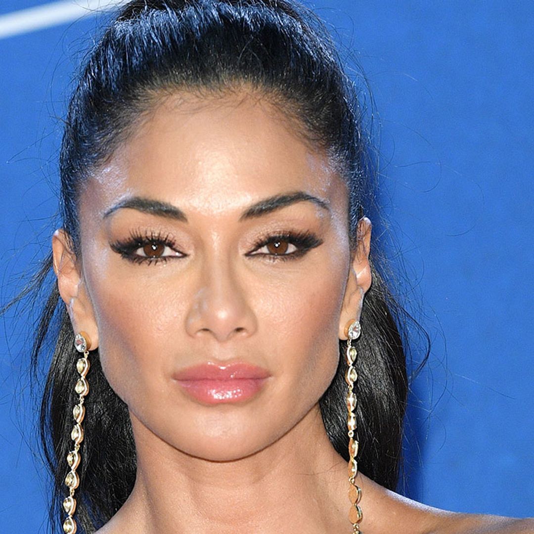 Nicole Scherzinger delivers another must-see look with incredible purple outfit