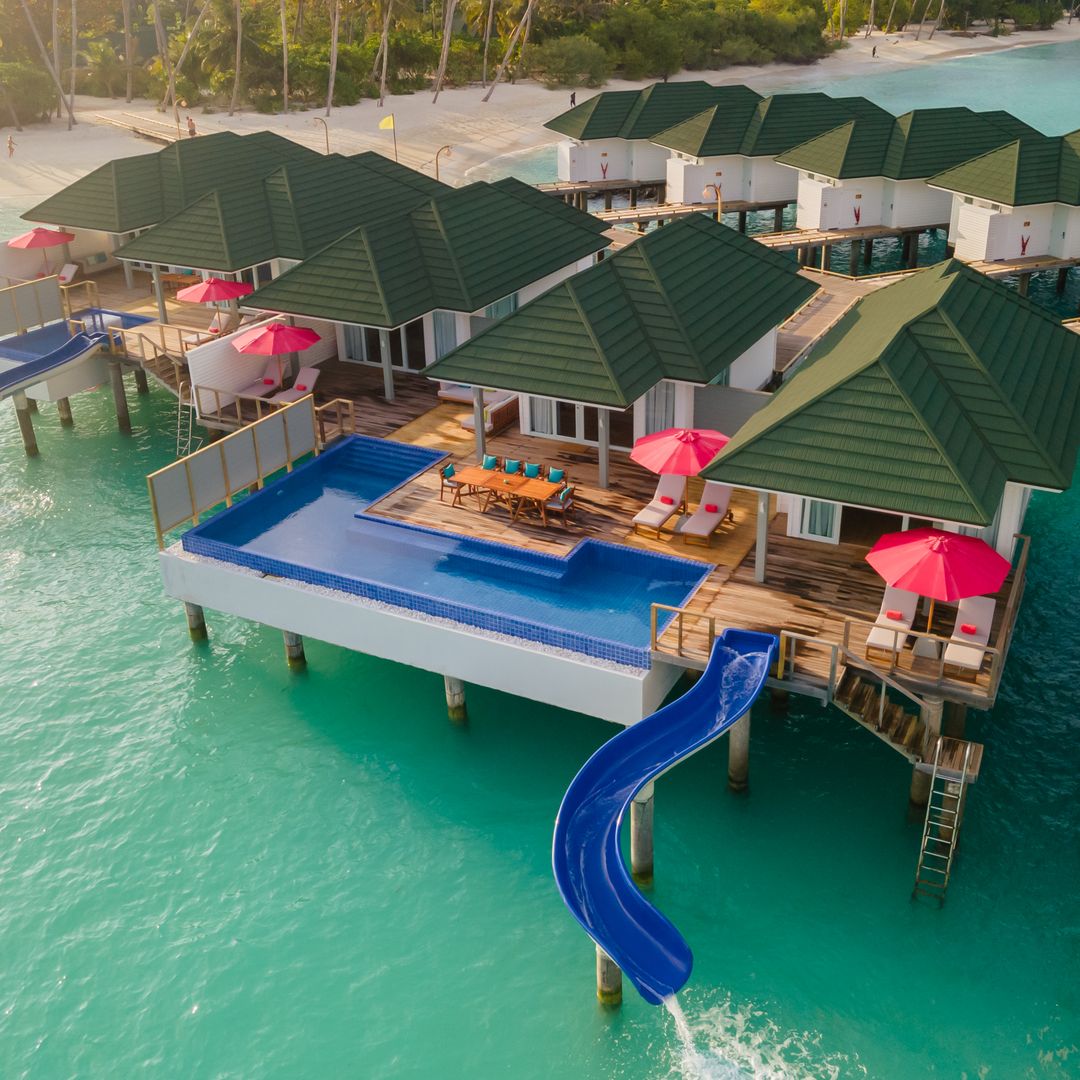 Maldives hut hotels with slides into the sea