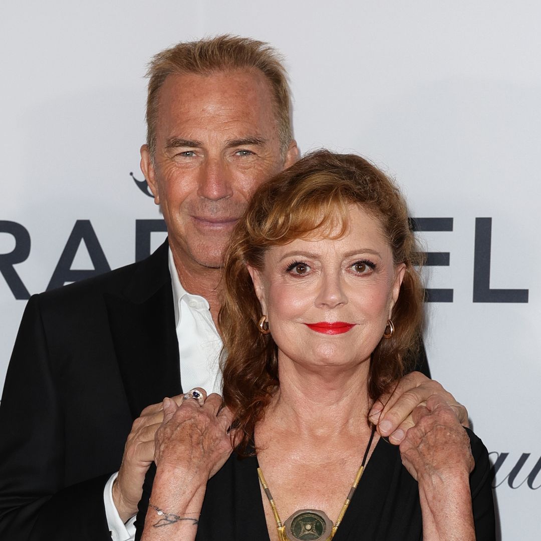 Susan Sarandon, 77, rocks plunging neckline as she hold hands with Kevin Costner, 69