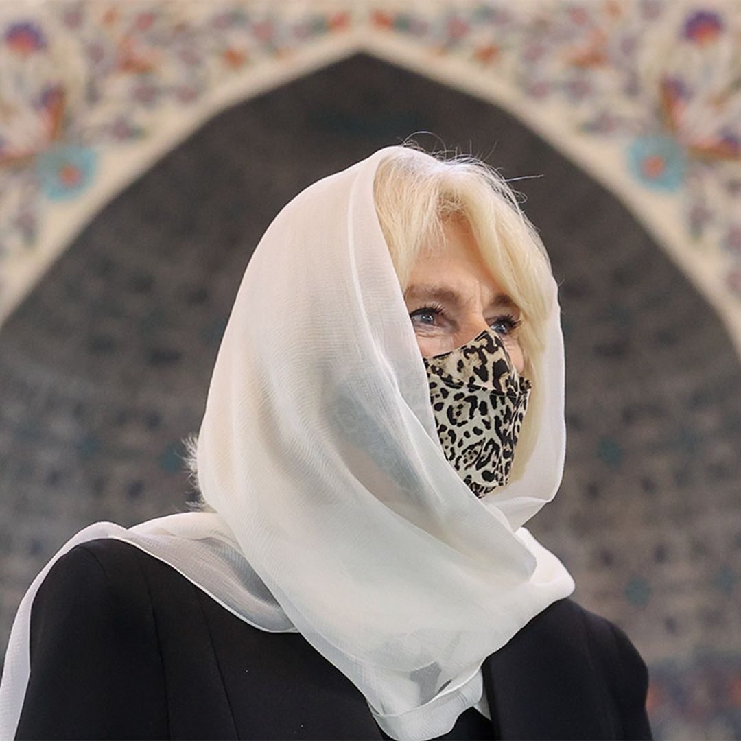 The Duchess of Cornwall rocks white headscarf and unique faux fur accessory at London Mosque