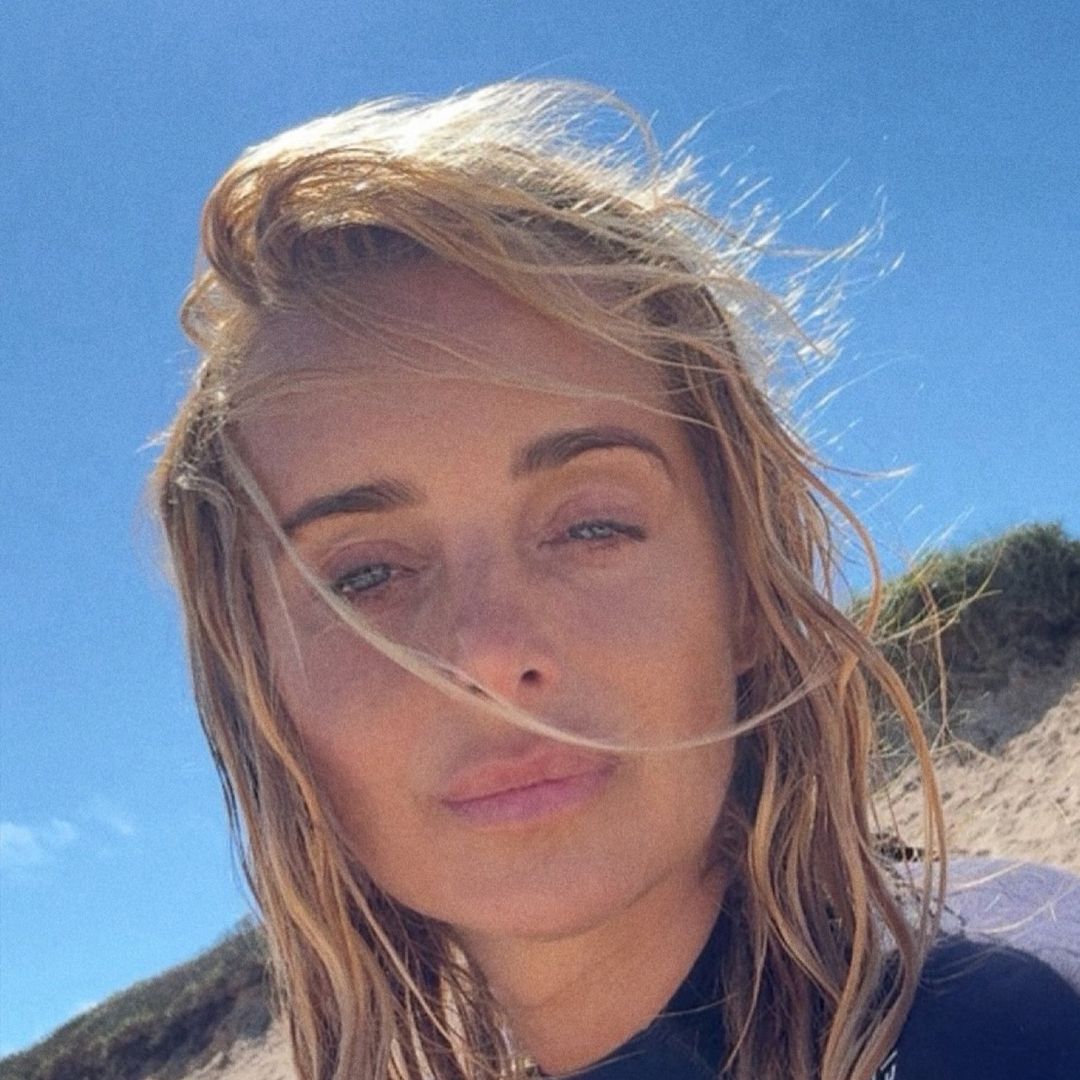 Louise Redknapp is a total siren in bronzed surfing photos