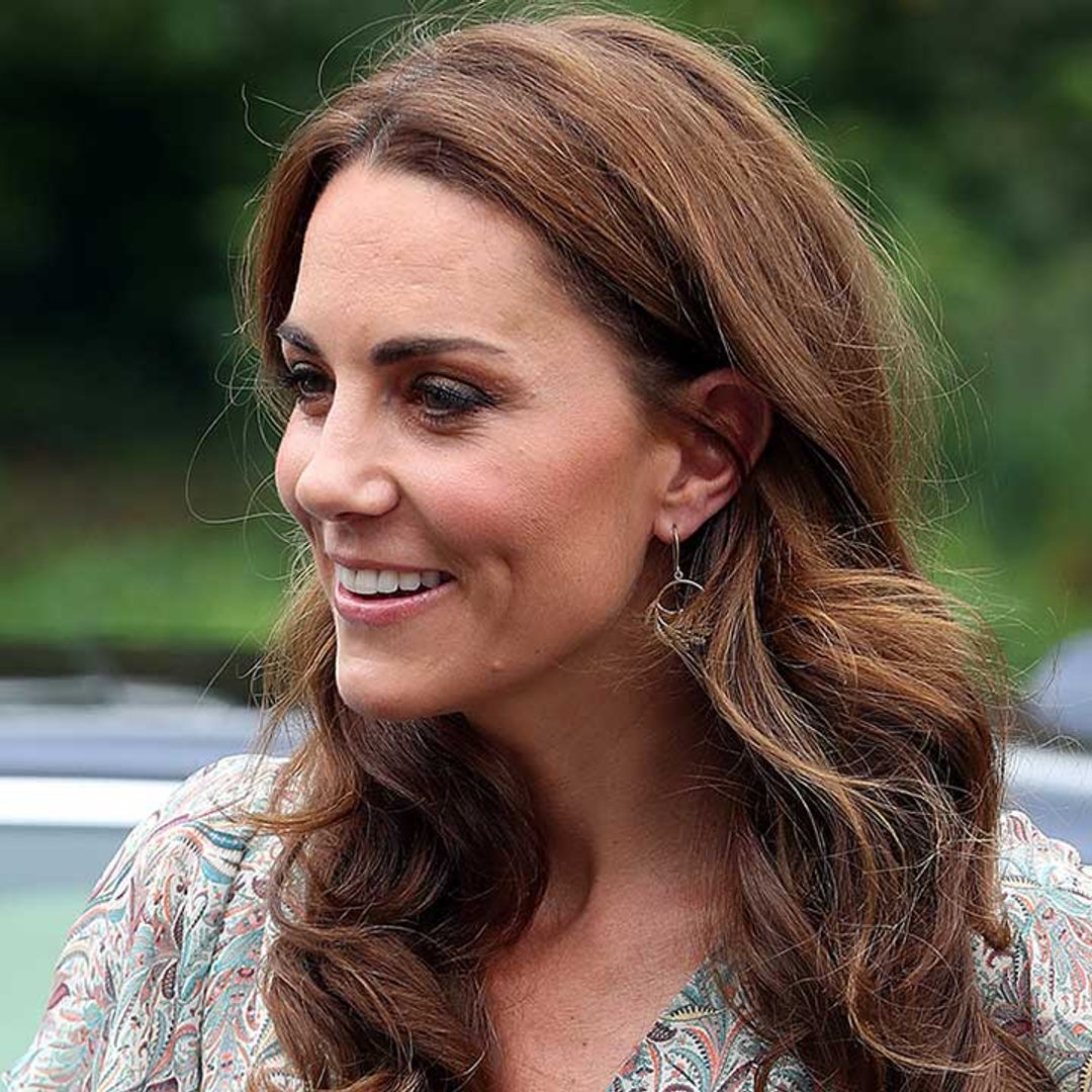 Kate Middleton is all smiles at photography workshop after picking up new patronage - best photos