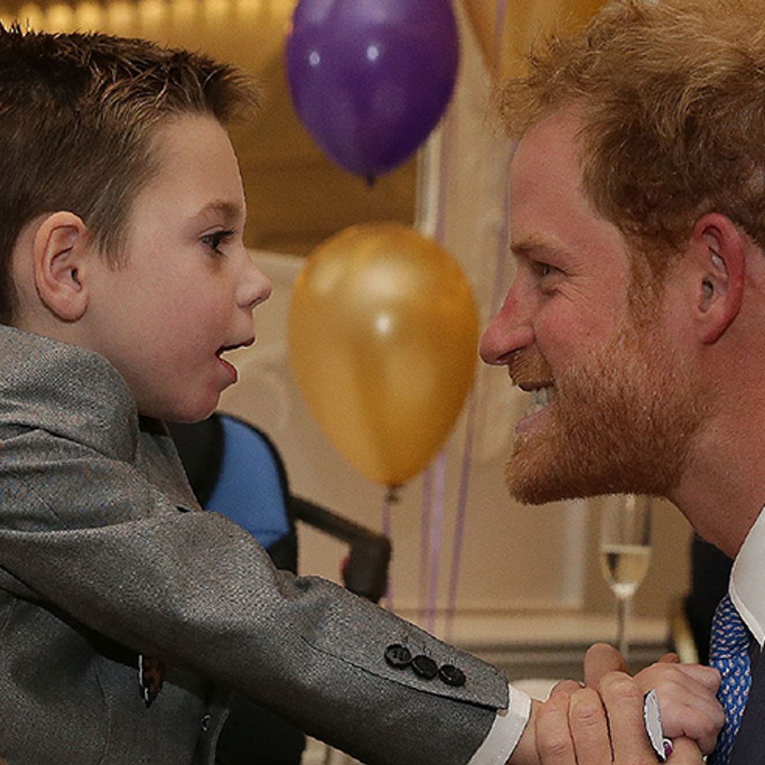 Prince Harry shares heart-warming hug with seriously ill little boy at WellChild Awards