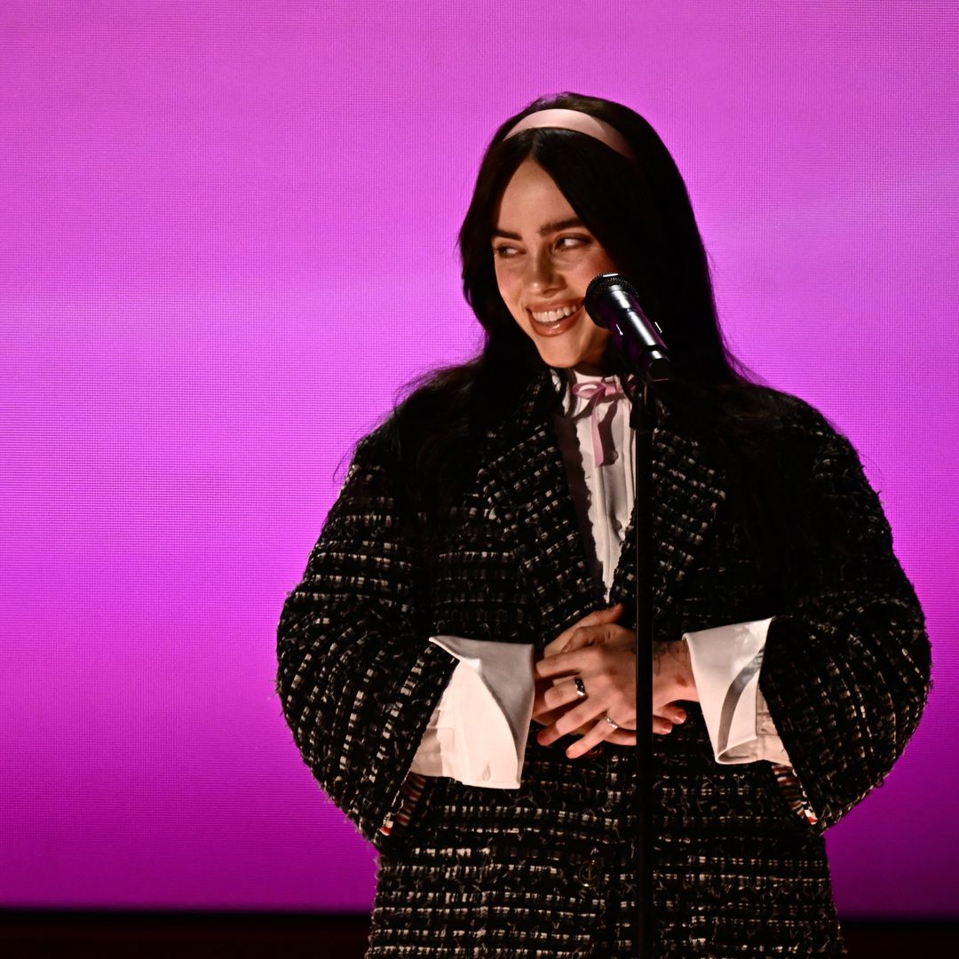 Billie Eilish wows in head-turning tweed as she moves Oscars audience to tears