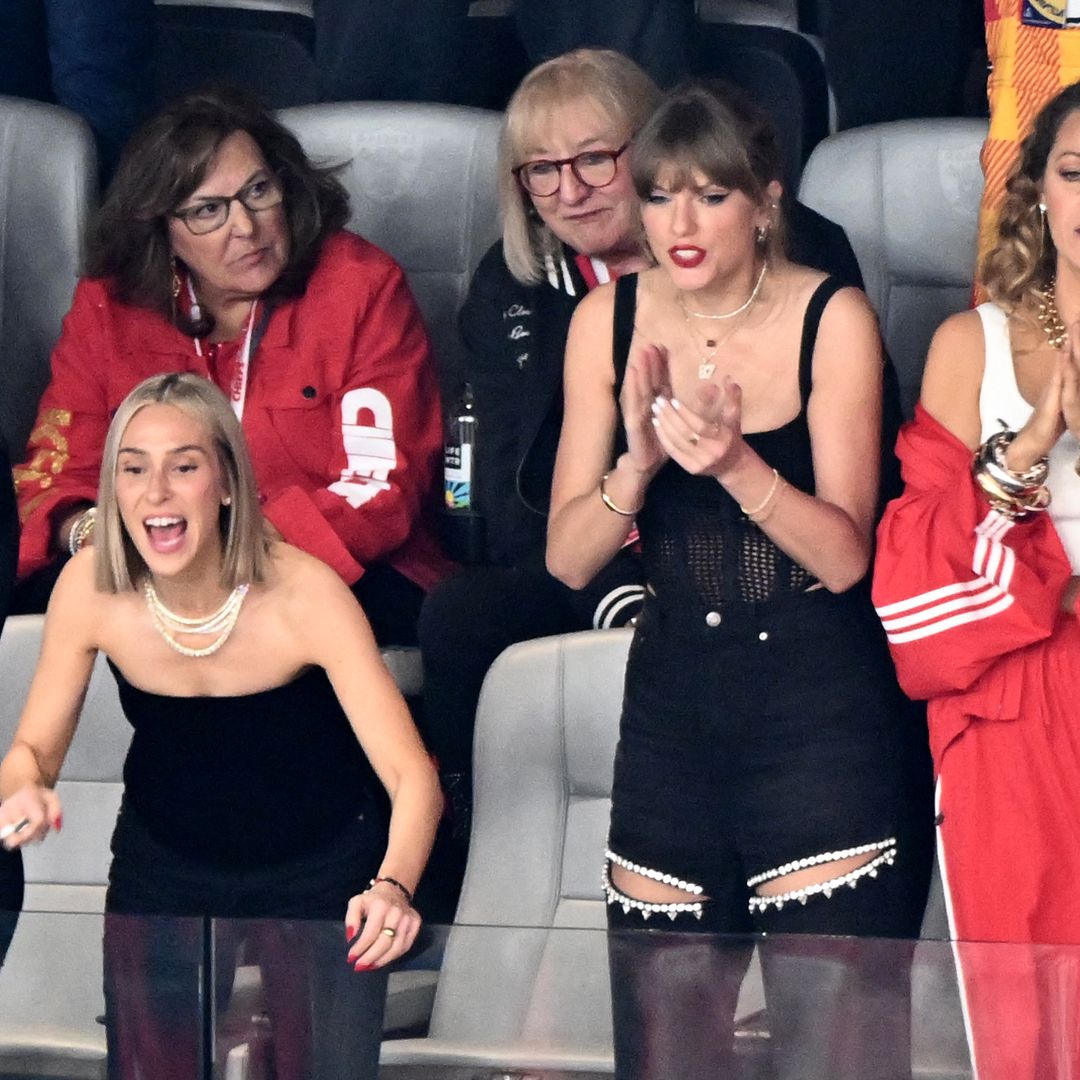 Taylor Swift applauding at the Super Bowl 