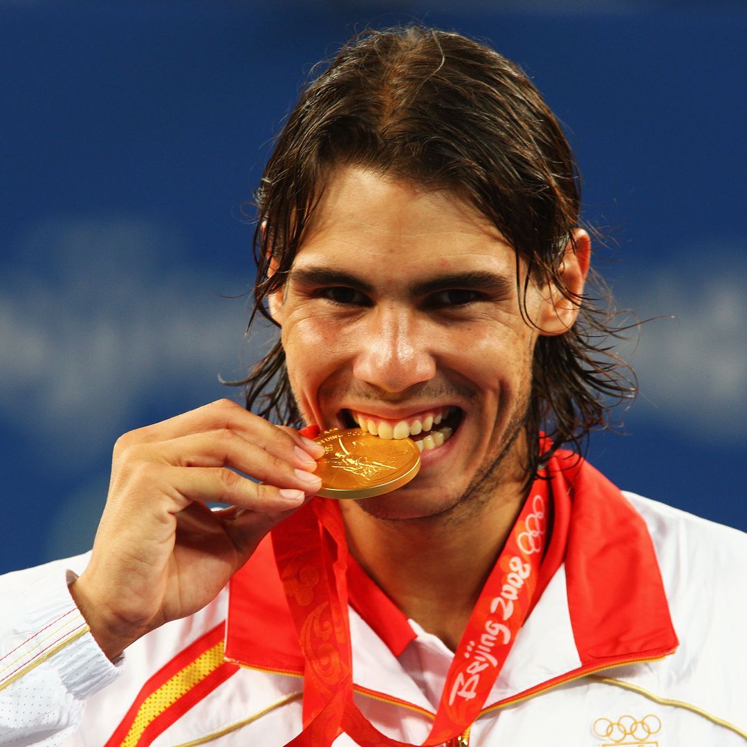 Rafael Nadal of Spain celebrates winning the gold medal against Fernando Gonzalez of Chile during the men's singles gold medal tennis match held at the Olympic Green Tennis Center during Day 9 of the Beijing 2008 Olympic Games on August 17, 2008 in Beijing, China.