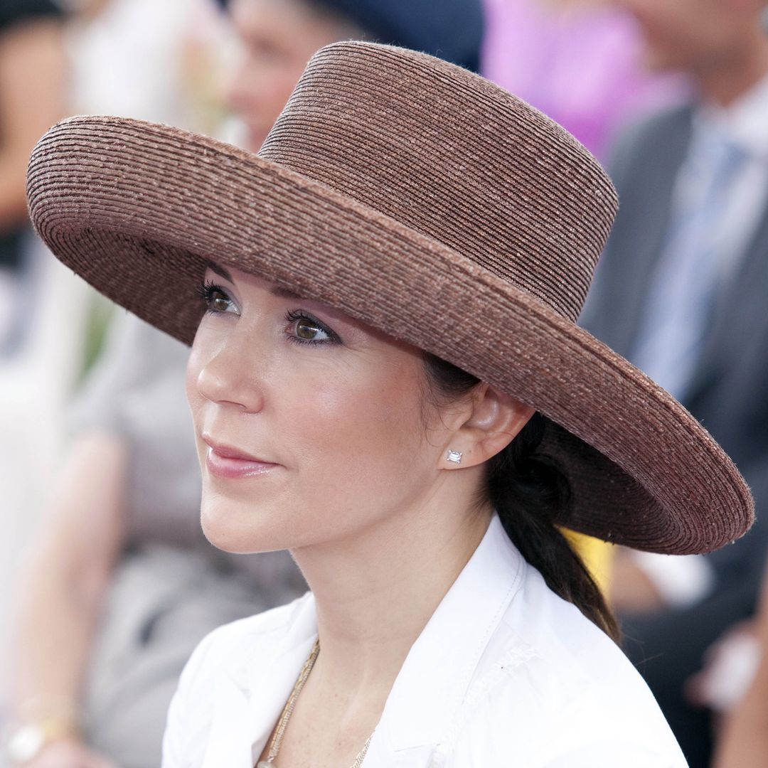 Queen Mary surprises in cinched dress and most divisive hat