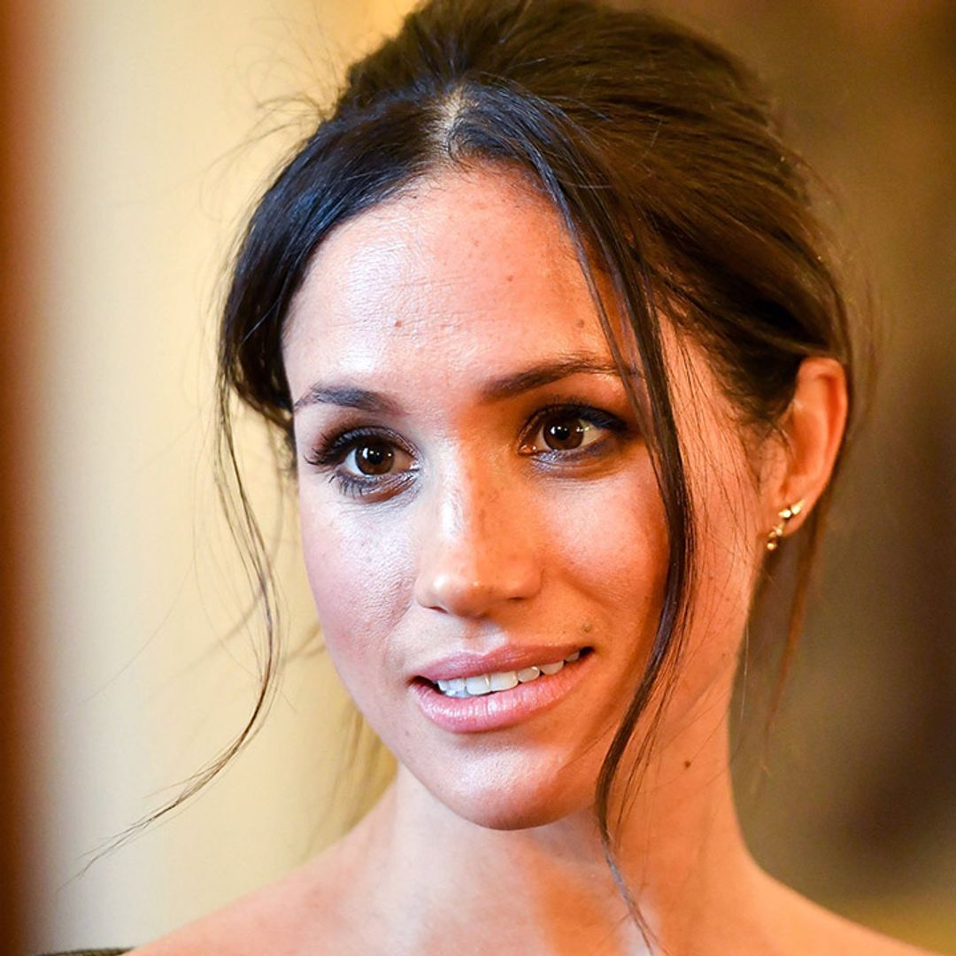 Meghan Markle's silk top is the most beautiful shade of orange you've ever seen