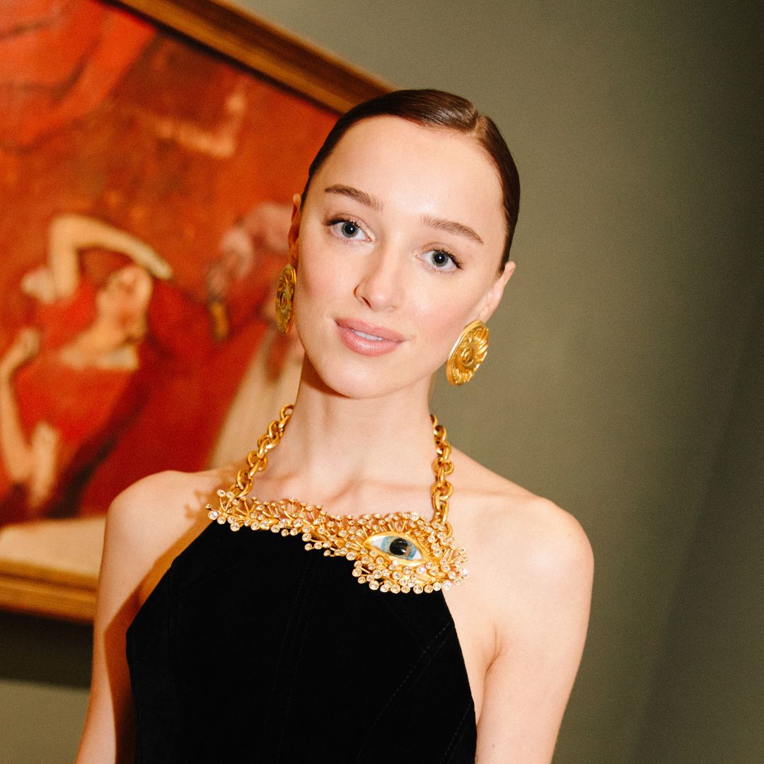 Phoebe Dynevor's black mini dress and leather combo is a sultry date night dream