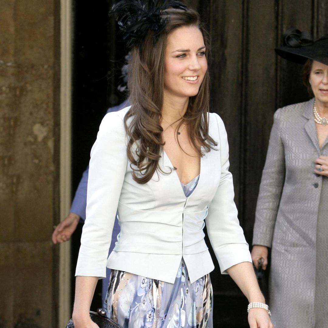 Princess Kate, 26, was a daring wedding guest in low-cut dress and corset jacket