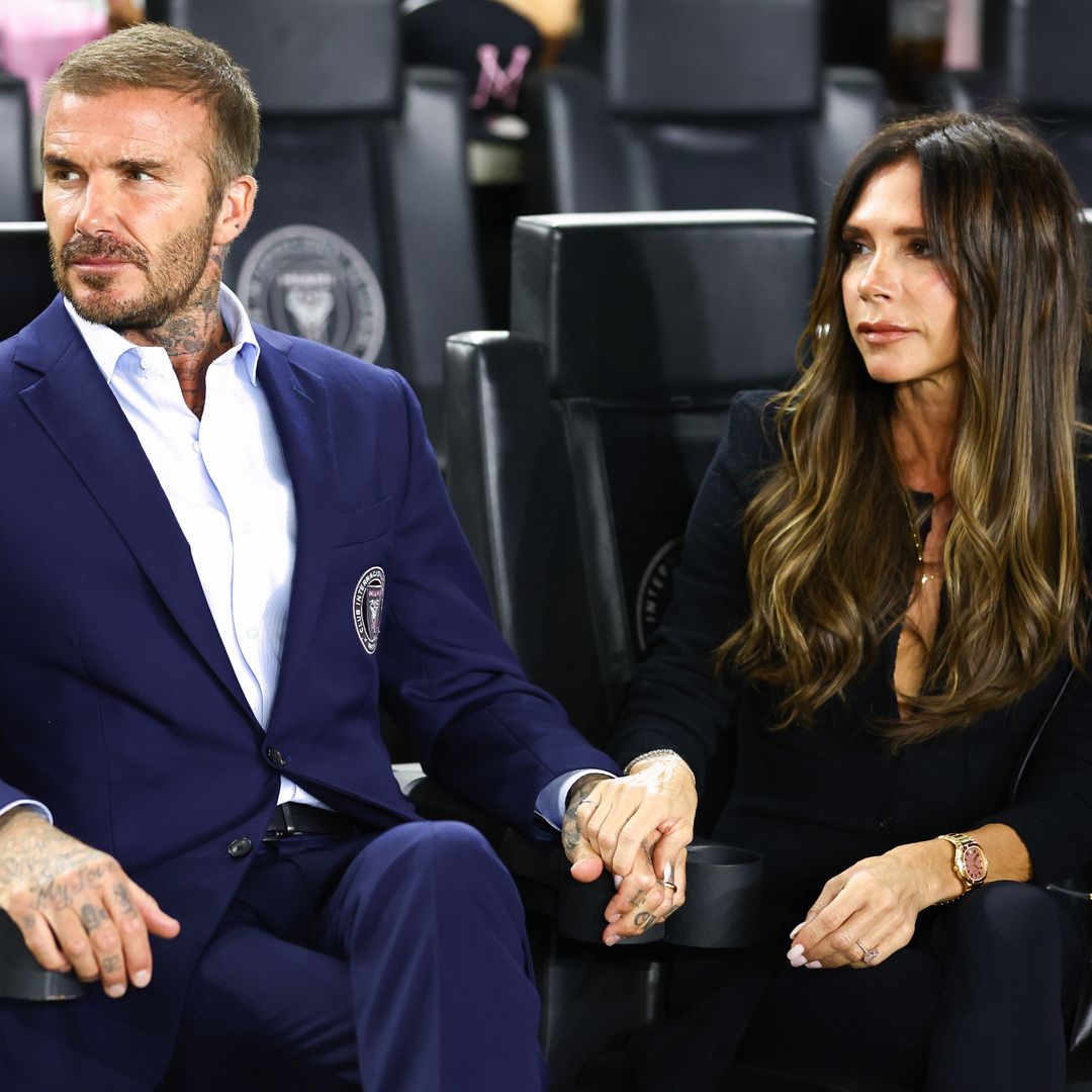 Victoria Beckham wears tights as trousers to support David's last match