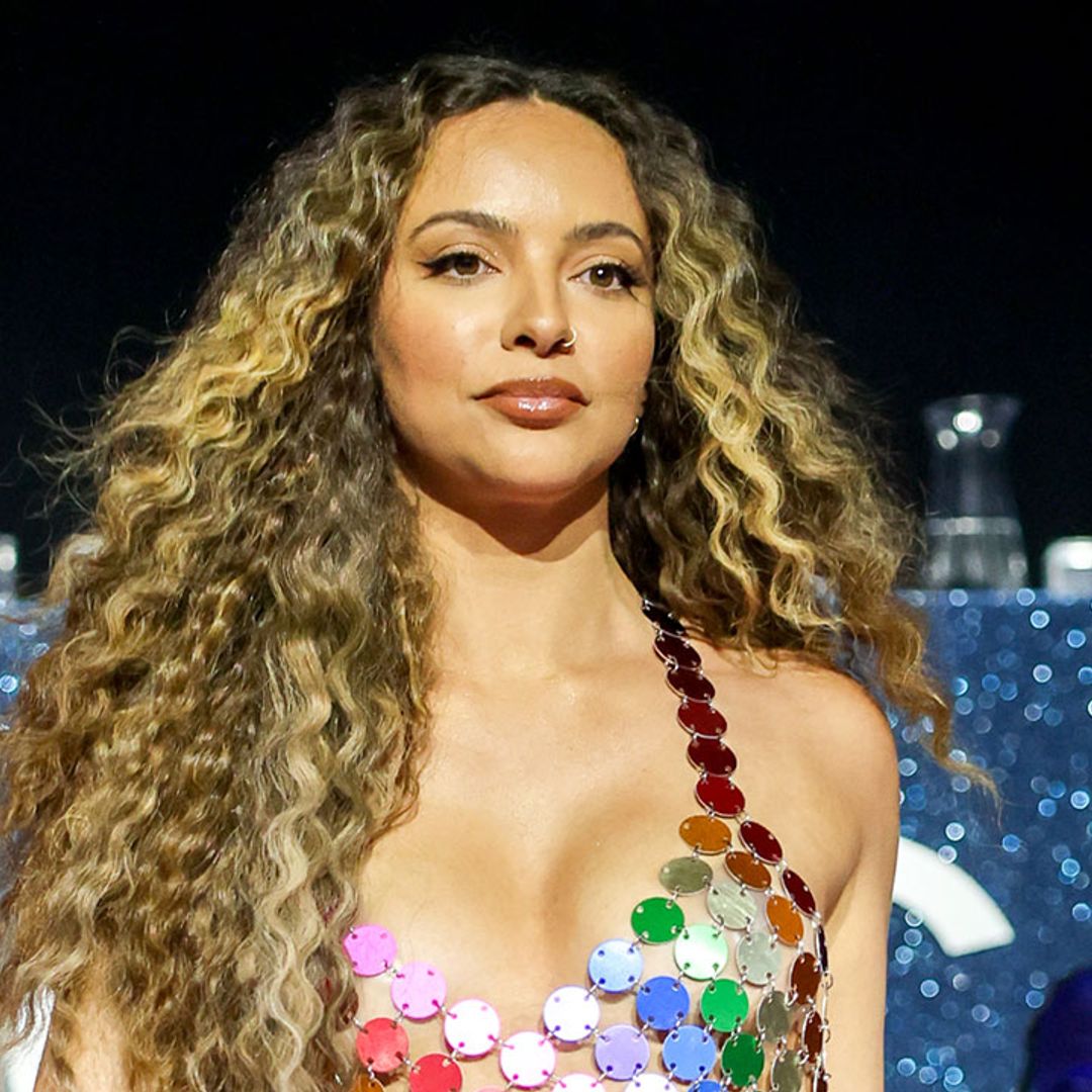 Little Mix's Jade Thirlwall shimmies in risqué rainbow-coloured mini dress