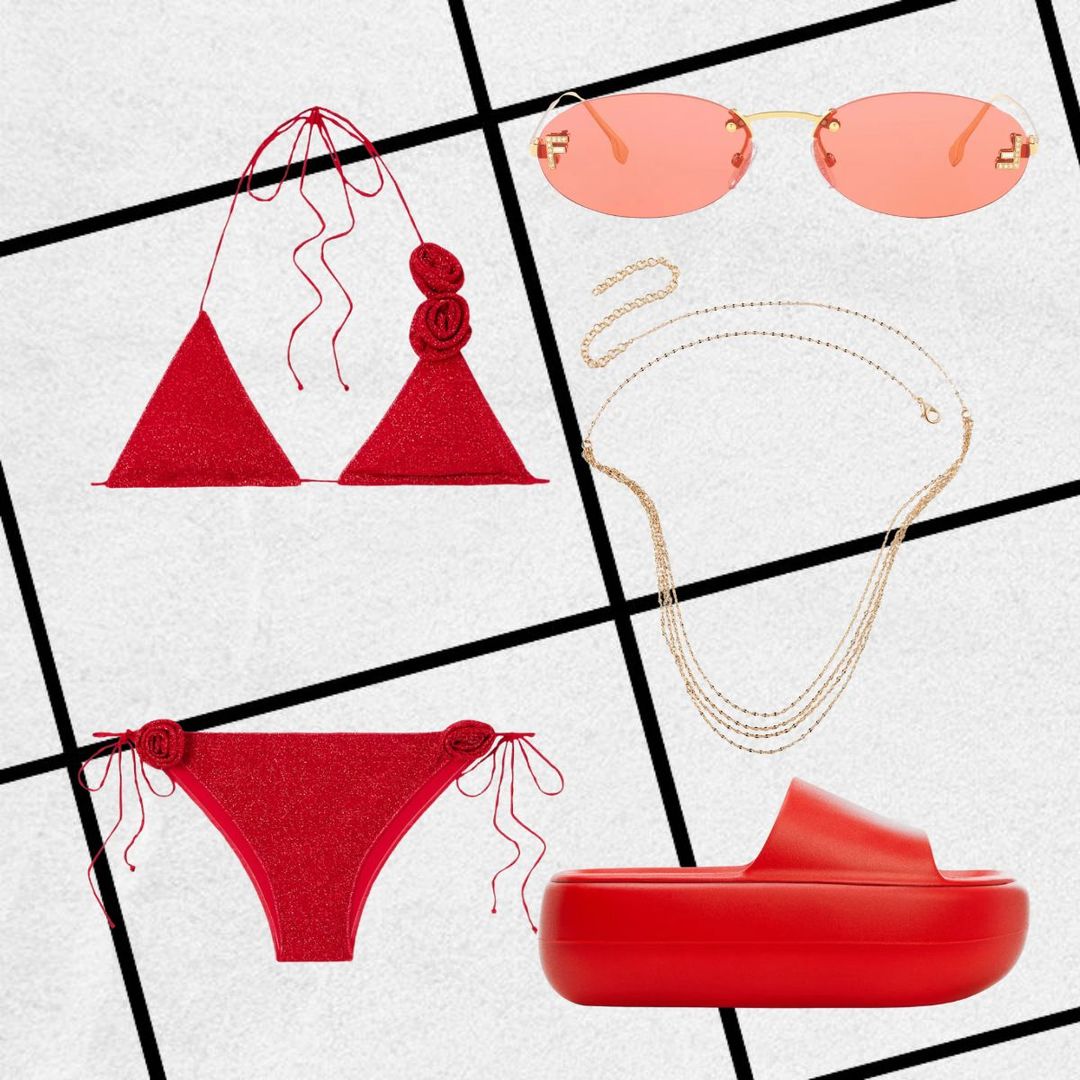 Outfit consisting of red rose-adorned bikini, platform slides, tinted shades and belly chain 